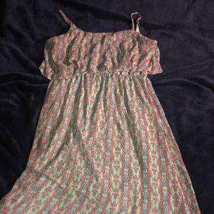 A long flowing spaghetti strap dress.